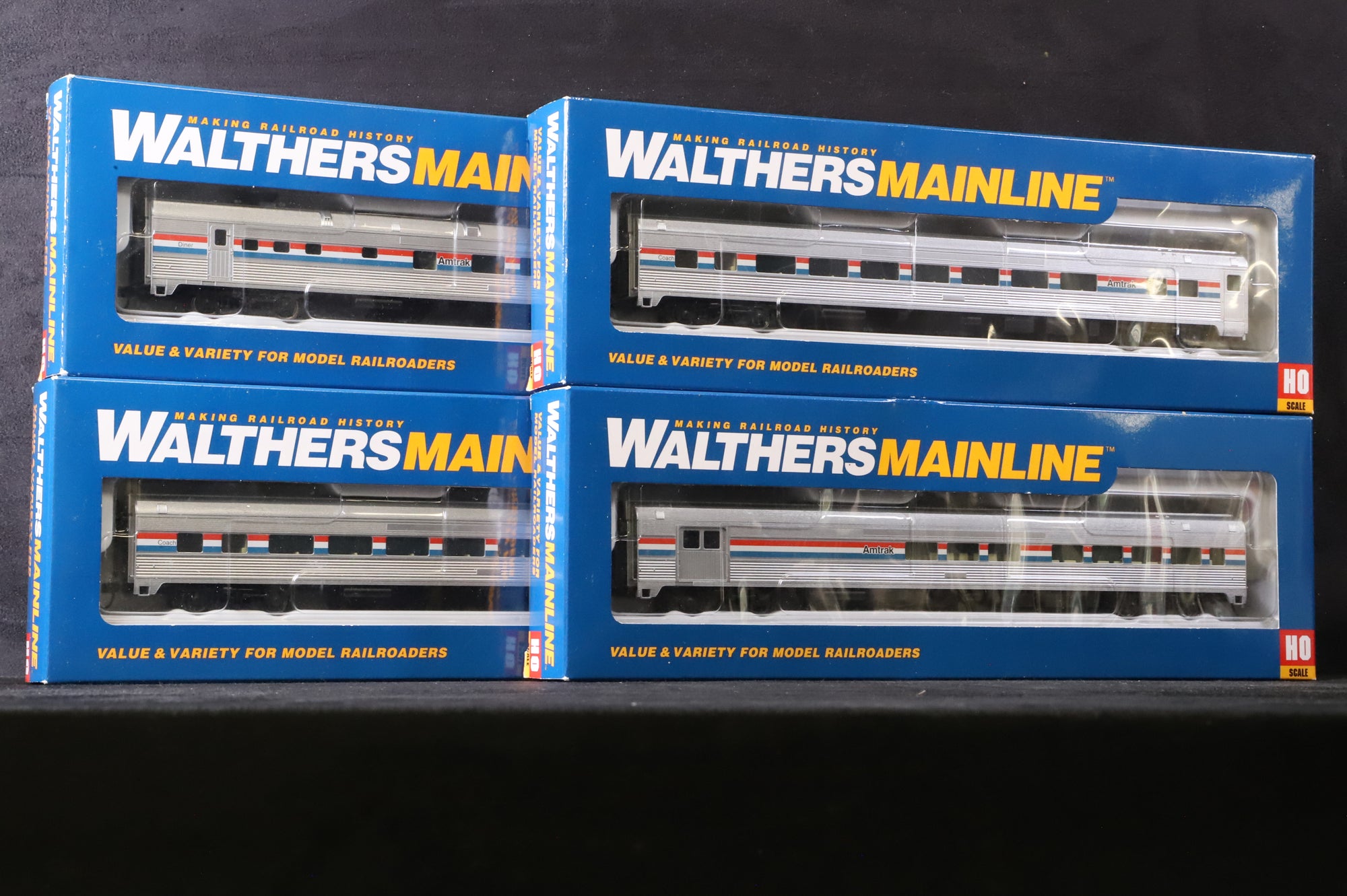 WalthersMainline HO Rake of 4 85' Budd Coaches in Amtrak Phase III Liveries