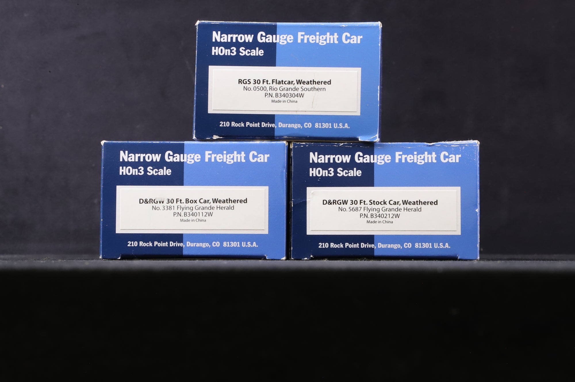 Blackstone HO Rake of 3 Assorted Rio Grande 30 Ft. Wagons - Weathered