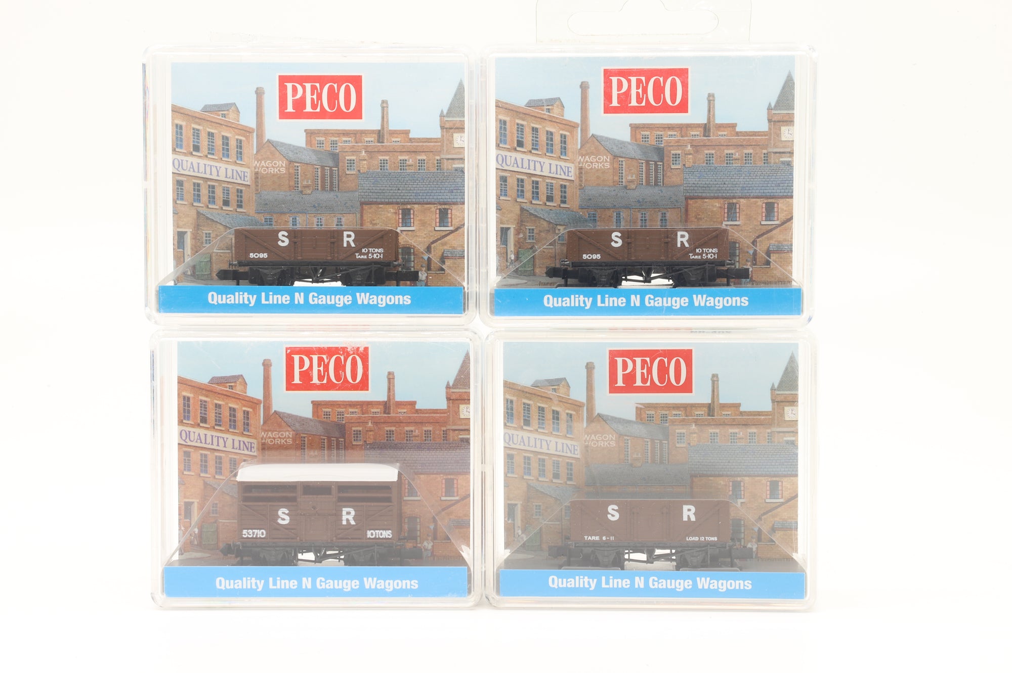 Peco N Rake of 4 SR Brown Plank Wagons