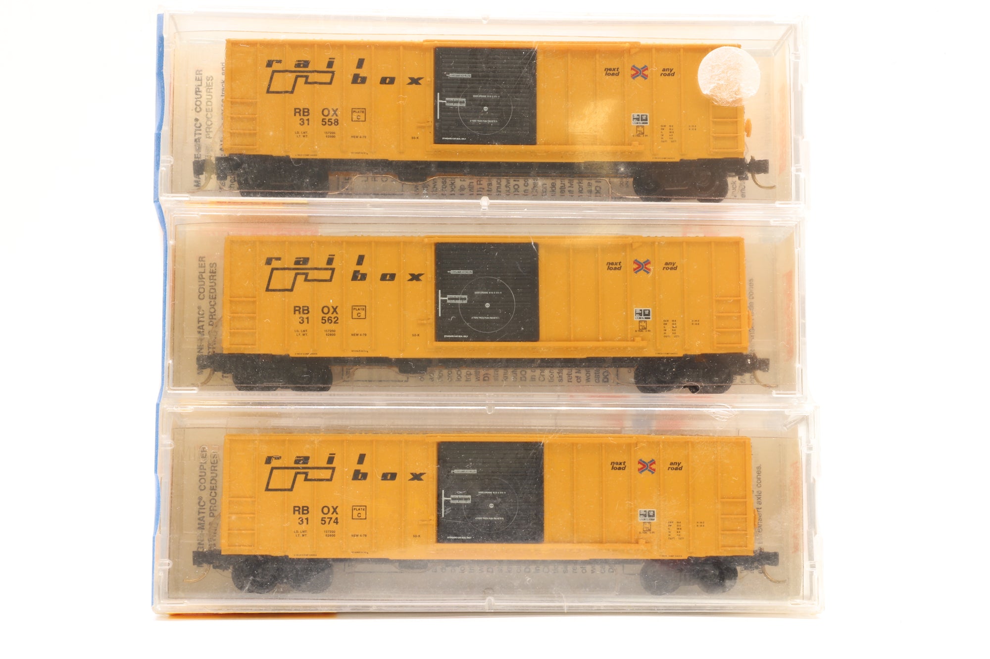 Microtrains N 25562 Triple Pack of 50' Box Cars in Rail Box Yellow