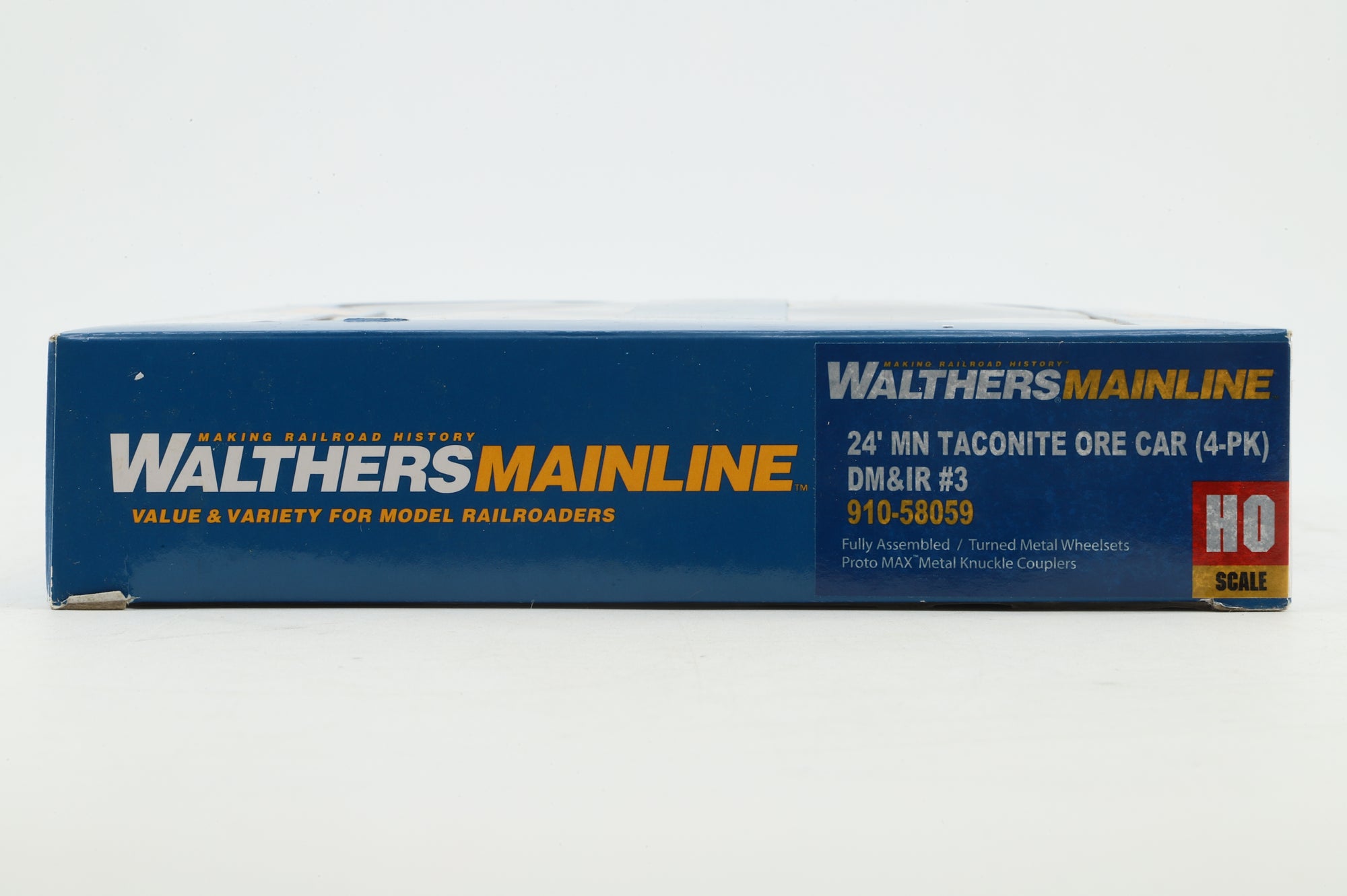 Walthers HO 4-Pack of 24' Michigan Ore Cars in DMIR Brown/Yellow - Pro-Weathered/Renumbered