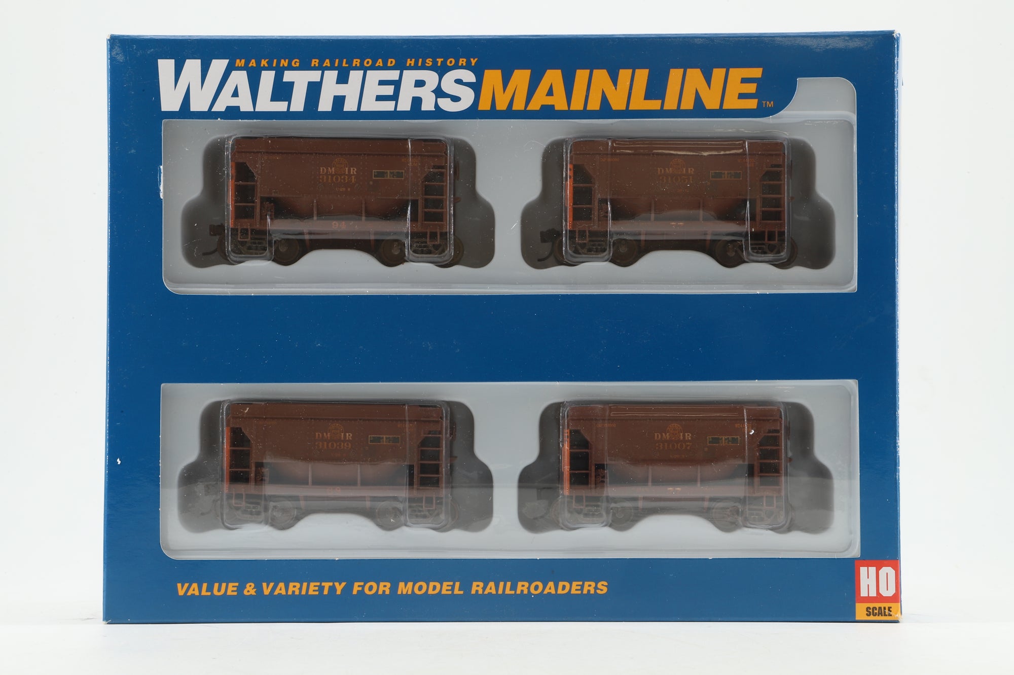 Walthers HO 4-Pack of 24' Michigan Ore Cars in DMIR Brown/Yellow - Pro-Weathered/Renumbered