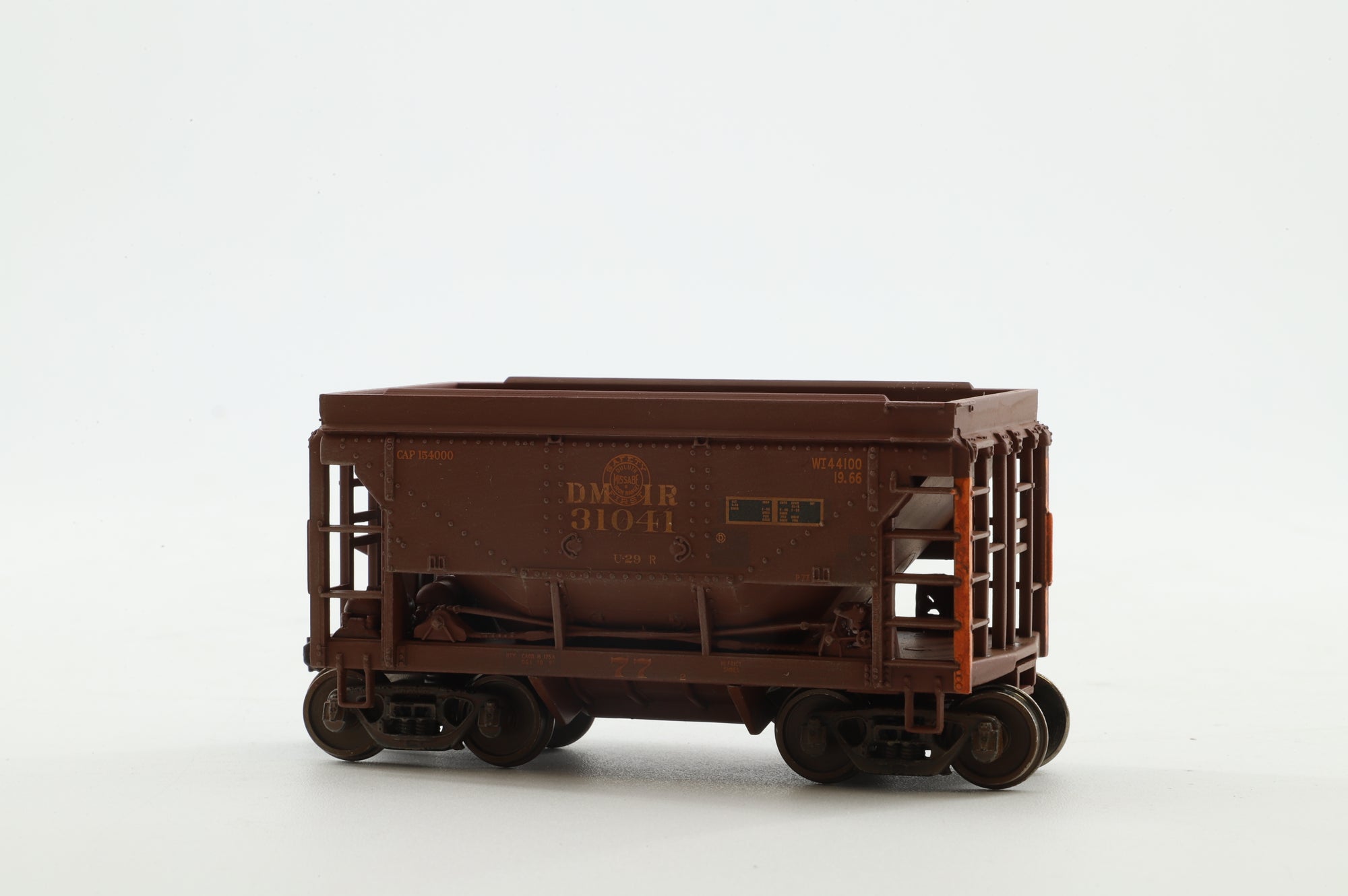 Walthers HO 4-Pack of 24' Michigan Ore Cars in DMIR Brown/Yellow - Pro-Weathered/Renumbered