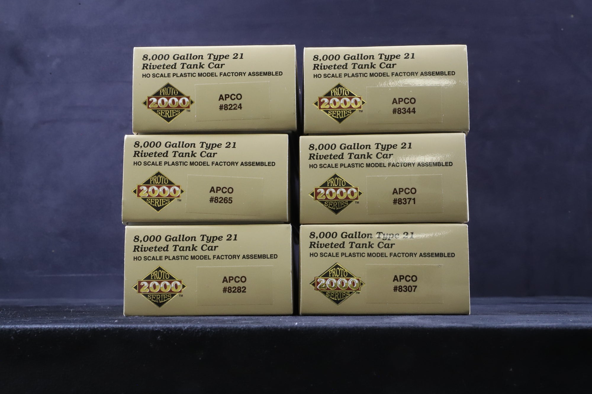 Proto 2000 HO Rake of 6 8000 Gallon Type 21 Riveted Tank Cars 'APCO'