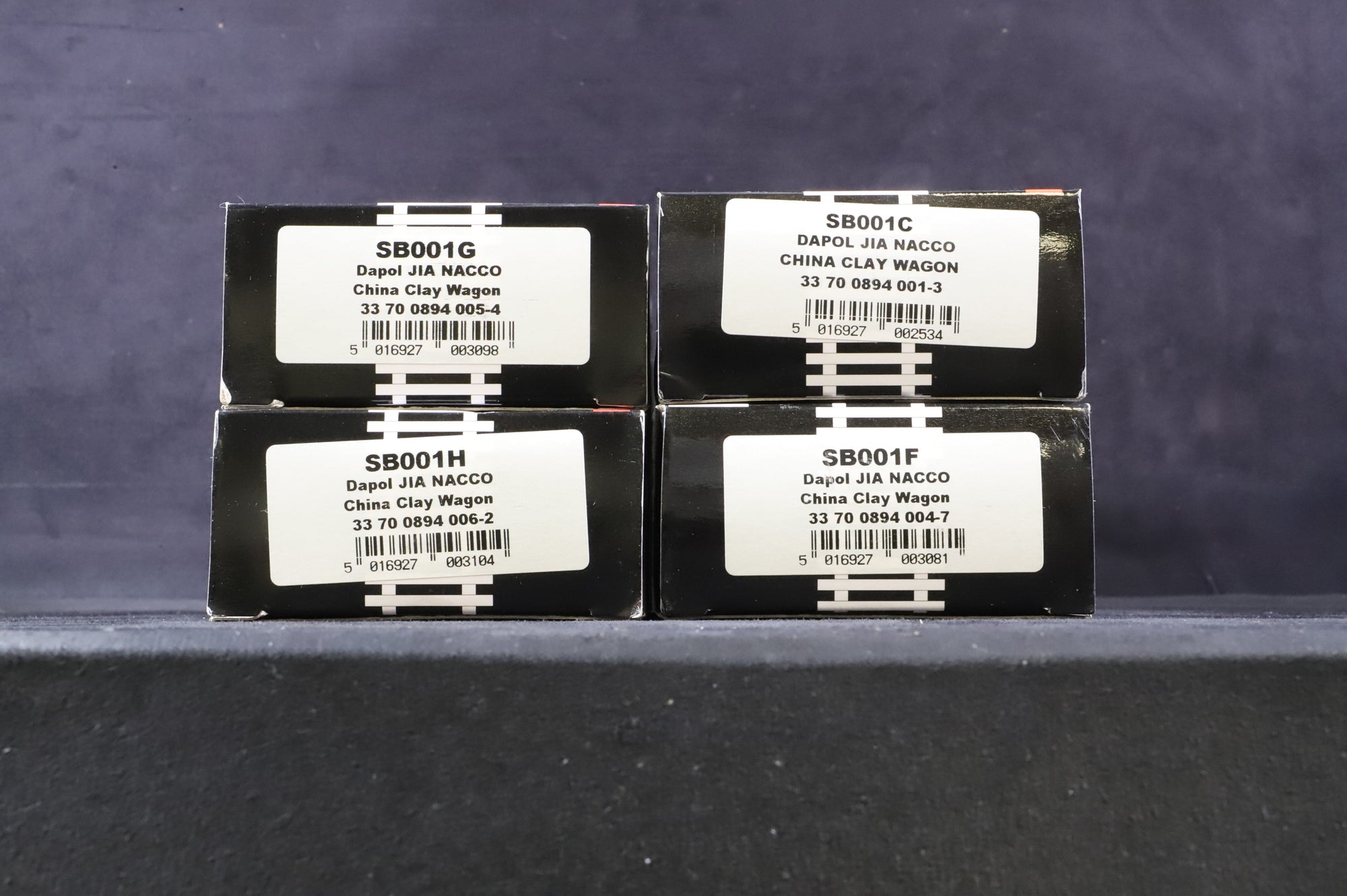 KRMC/Dapol OO SB001C/F/G/H Rake of 4 JIA Wagons in Nacco/Imerys Livery - Weathered