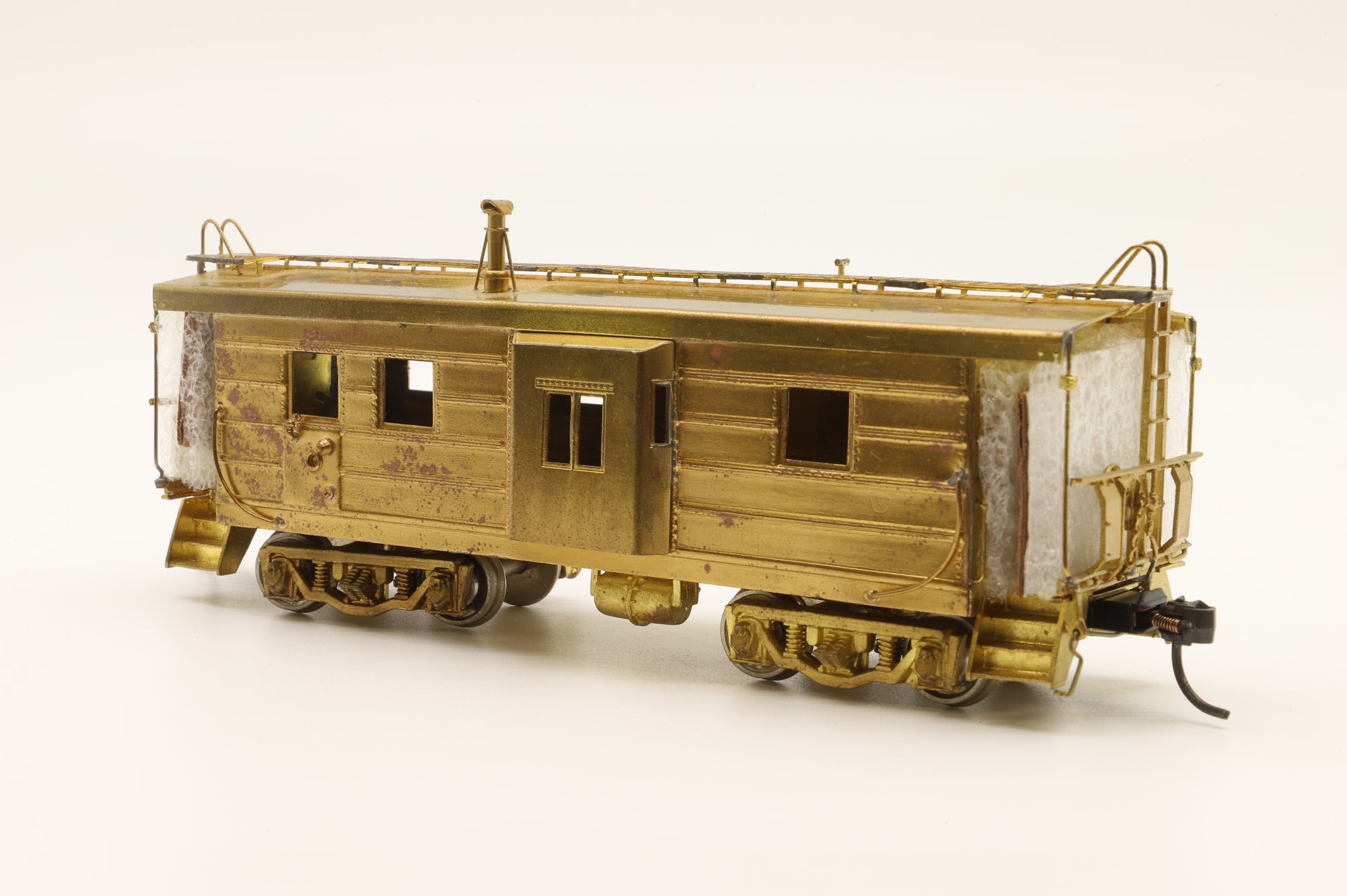 Overland Models HO Brass 1177 Milwaukee Bay Window Caboose w/ Drop Centre Trucks Unpainted